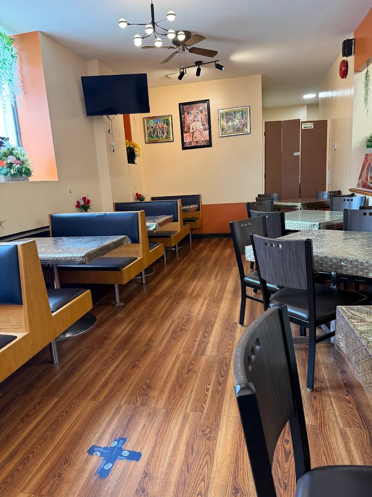 Booth seating in the dining room at Tom Yum Thai Restaurant, 859 Sherbrook Street, Winnipeg, MB