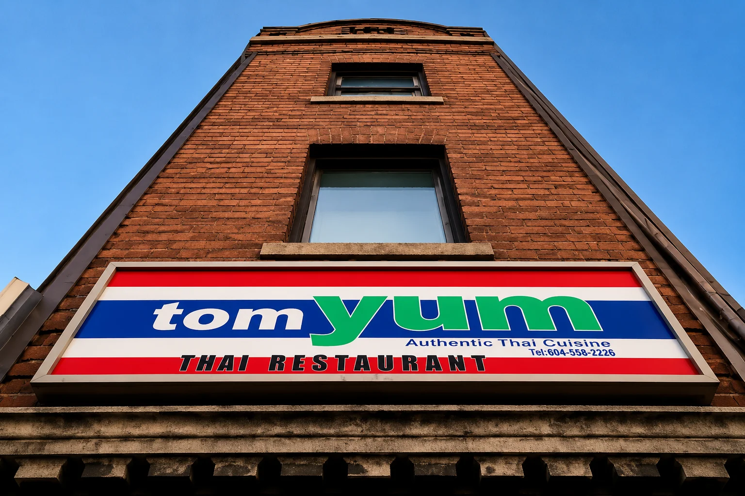 Thai curries, rice and sides served at Tom Yum Thai Restaurant on Sherbrook Street in Winnipeg, MB